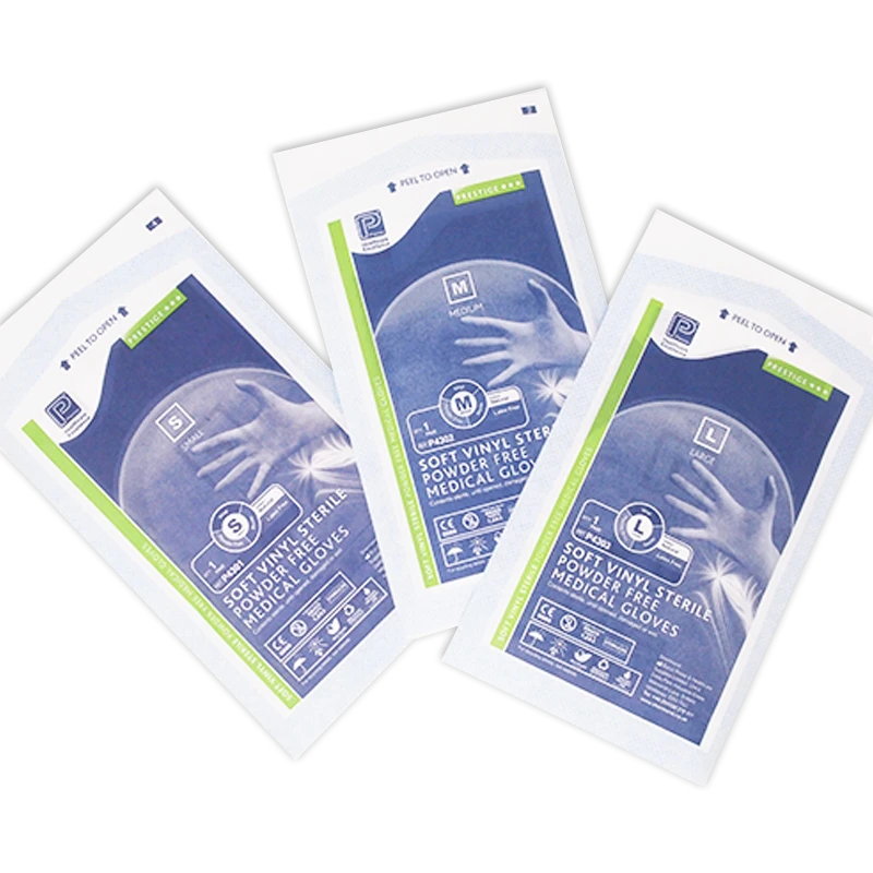 Sterile gloves in paper packaging of small medium and large sizes